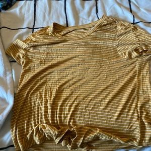 Cute Yellow and white striped shirt!! You can dress it up or dress it down!